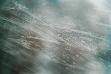 Glass Window Covered With Ice And Rain Drops