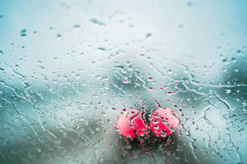 Glass Window Covered With Ice And Rain Drops