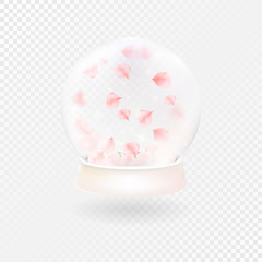 Fototapeta na wymiar Snow globe with falling rose petals.