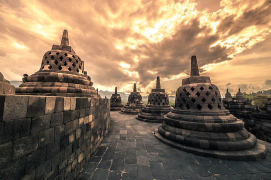 Dramatic sunset Borobudur Temple at sunset Yogyakarta, Java, Indonesia.