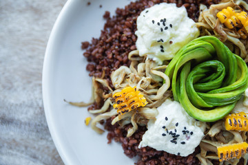Delicious dish with Avocado, cheese, corn and sprouted wheat grains. © blackday