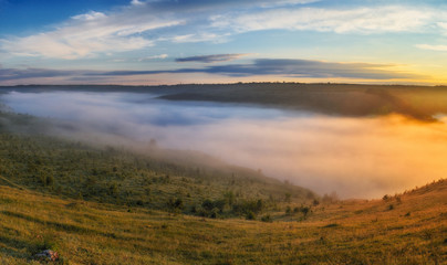 foggy canyon of a picturesque river. spring dawn. morning in national park
