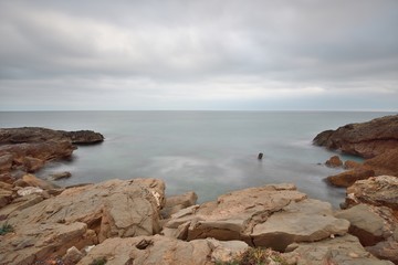 Fototapeta na wymiar Atardecer en la costa