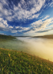 foggy canyon of a picturesque river. spring dawn. morning in national park
