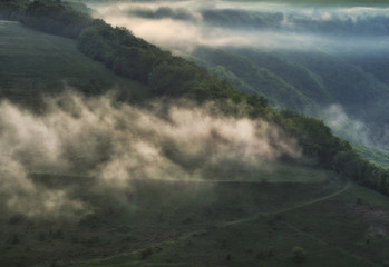 foggy canyon of a picturesque river. spring dawn. morning in national park
