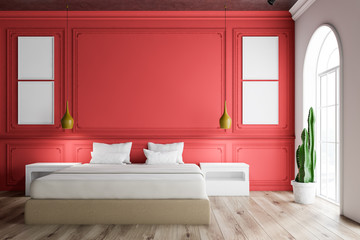 Red bedroom with poster gallery
