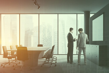 Gray panoramic meeting room, columns, people