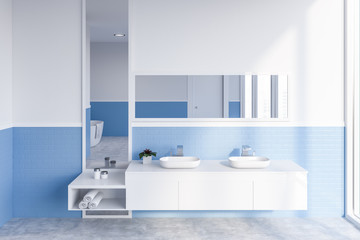 Fototapeta na wymiar White and blue bathroom, double sink