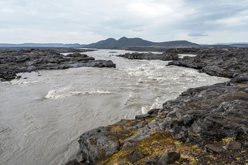 Fototapeta na wymiar The flow of Jokulsa a Fjollum glacial river
