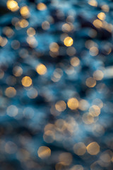 abstract details of rocky beach pebbles in sunset by the sea