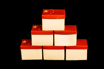 Obraz premium Box with flag of China on black background