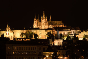 Fototapeta na wymiar Evening view of Prague Castle with surrounding buildings, Czech Republic