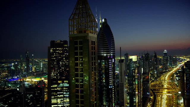 Aerial illuminated night view Sheikh Zayed road Dubai 