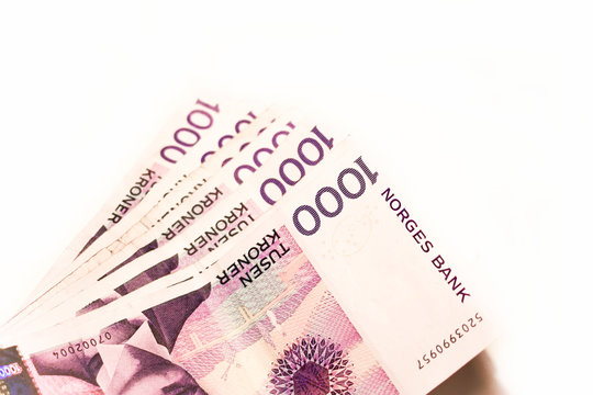 Transfer twisted banknotes. Money in hand close-up.