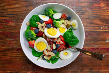 Closeup top view of colorful healthy salad