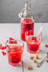 Infused water with red currant and sugar
