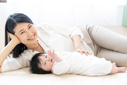 portrait of young mother and baby relaxing