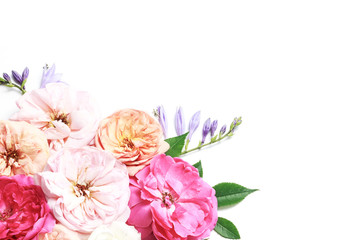 Obraz na płótnie Canvas Flowers composition. Frame made of rose flowers on white background.