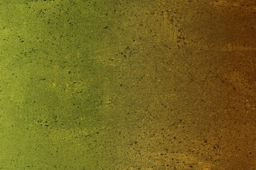 orange grainy grungy stucco on the wall texture - pretty abstract photo background