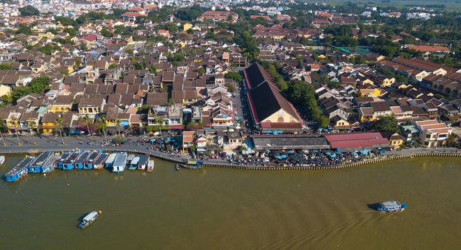 Panorama of Hoian market. Aerial view of Hoi An old town or Hoian ancient town in sunny day. Royalty high-quality free stock photo image top view of Hoai river and boat traffic in Hoi An market