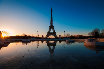 Fototapeta na wymiar Sunrise over Eiffel tower, Paris, France