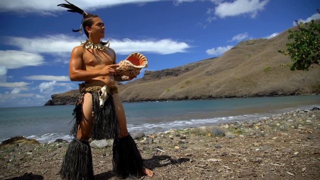 Marquesan native male playing conch shell Nuku Hiva