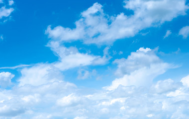 Beautiful white clouds with blue sky.Color shade gradient from white to blue for background wallpaper.;