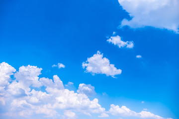 Beautiful white clouds with blue sky.Color shade gradient from white to blue using for fresh background wallpaper.