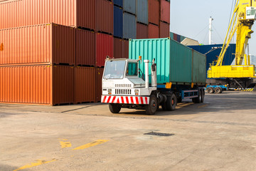 Truck with Industrial Container Cargo for Logistic Import Export at yard