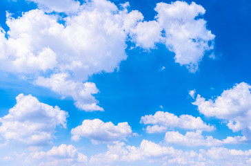 Obraz na płótnie Canvas Beautiful white clouds with blue sky.Color shade gradient from white to blue using for fresh background wallpaper.
