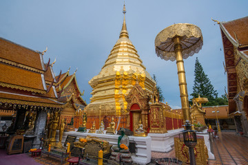 Fototapeta premium Wat Phra That Doi Suthep an iconic historical landmark in Chiang Mai the northern province of Thailand at evening.