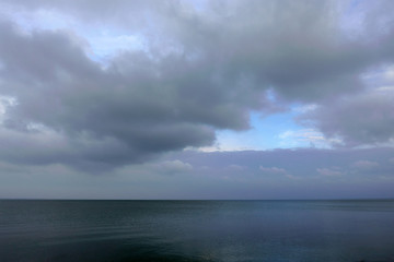 Sea under the cloudy sky - 242931256