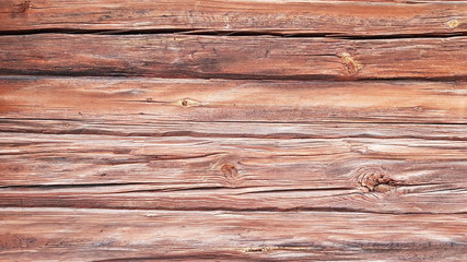 Old dark log. Background of cracked logs.  