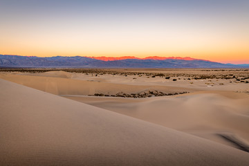 Fototapeta na wymiar Sunrise over the Mesquite Flat Sand Dunes