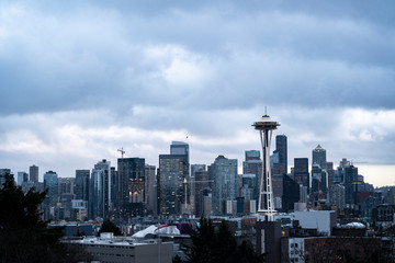 Fototapeta premium View of Downtown Seattle with dark clouds hovering over