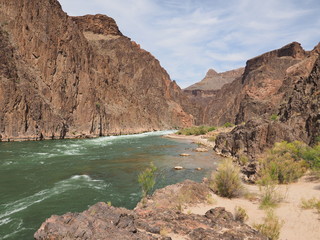 Fototapeta na wymiar Granite Rapids and the Colorado River in Grand Canyon National Park, Arizona.