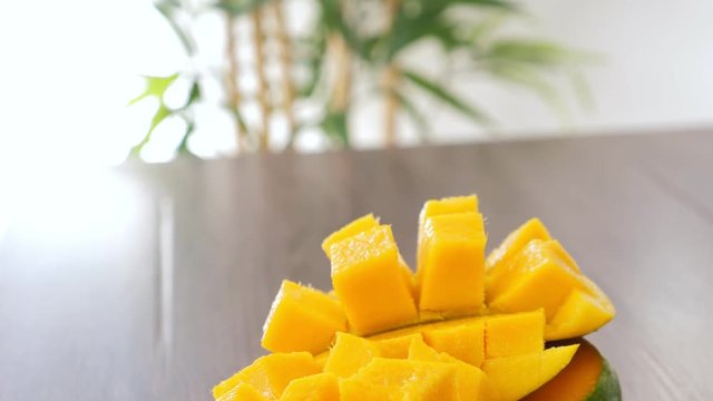 Half cutted cubes slices ripe mango, nobody