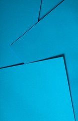 Blue paper material design. Geometric unicolour shapes