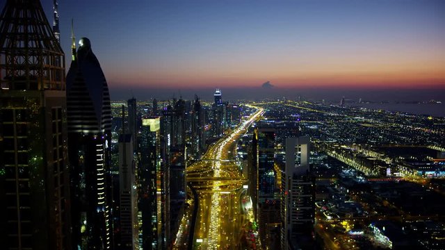 Aerial illuminated night view Sheikh Zayed road Dubai 