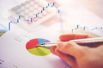 Business report chart preparing graphs calculator stock graphs and number Display screen / Summary report in Statistics