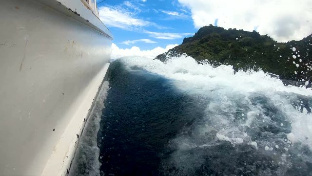 Boat fishing near Tahuata Marquesas Island South Pacific 