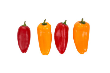 Ovely mini red and yellow  peppers on white isolate background. Fresh vegetable
