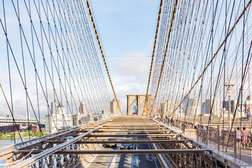 Views of the city part Brooklyn between the steel cables of the Brooklyn Bridge, New York, United States
