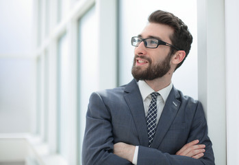 close up.pensive businessman standing in the office