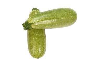 Two zucchini, top view, isolated on white background. Fresh vegetables