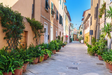 Fototapeta na wymiar View of narrow street in Orbetello on peninsula Argentario. Tuscany. Italy