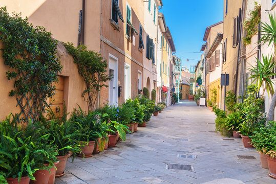 Fototapeta View of narrow street in Orbetello on peninsula Argentario. Tuscany. Italy
