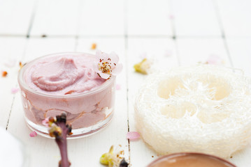 Beauty products and peach flowers