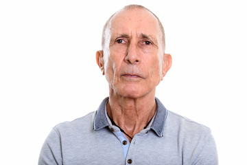 Close up of senior man face isolated against white background