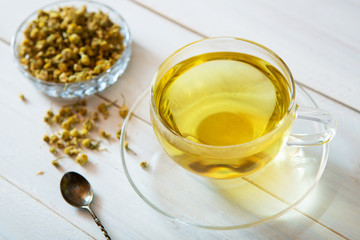 chamomile tea on white background